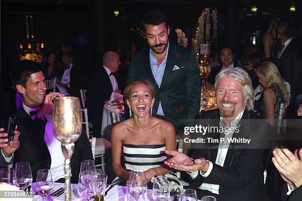 Novak Djokovic, Jelena Ristic, Jeremy Piven and Richard Branson attend the Novak Djokovic Foundation inaugural London gala dinner at The Roundhouse...