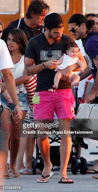 Cesc Fabregas and his daughter Lia Fabregas are seen on July 8, 2013 in Ibiza, Spain.