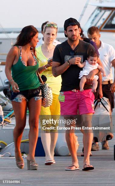 Cesc Fabregas, his girlfriend Daniella Semaan and their daughter Lia Fabregas are seen on July 8, 2013 in Ibiza, Spain.