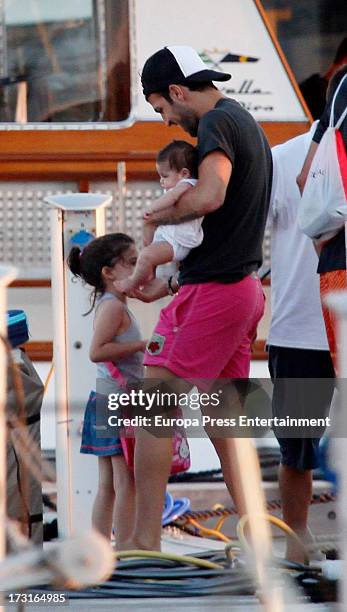 Cesc Fabregas and his daughter Lia Fabregas are seen on July 8, 2013 in Ibiza, Spain.