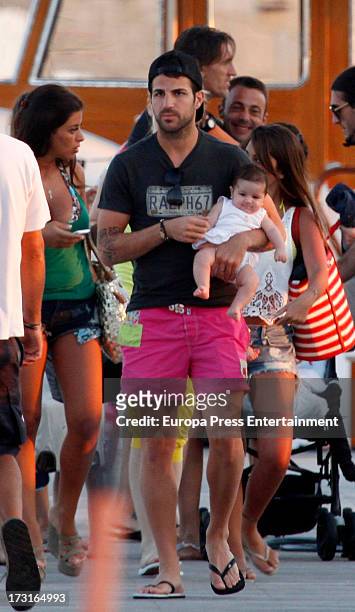 Cesc Fabregas, his girlfriend Daniella Semaan and their daughter Lia Fabregas are seen on July 8, 2013 in Ibiza, Spain.