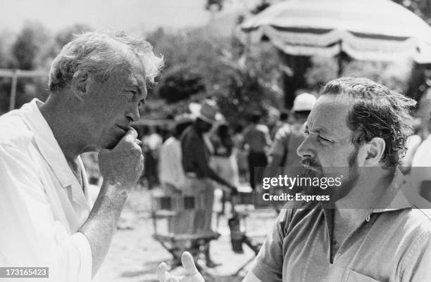 American director John Huston with playwright Tennessee Williams on location during filming of in 'The Night of the Iguana' in Puerto Vallarta,...