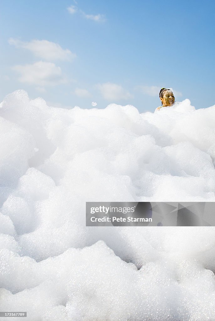 Women in detergent foam at Mud Run.