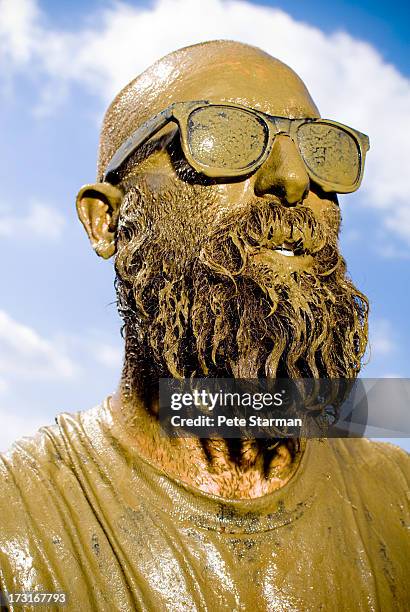 mud run competitor covered in mud(18-25) yrs old. - mud stock pictures, royalty-free photos & images