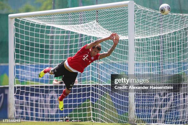 Mario Mandzukic of FC Bayern Muenchen jokes as a goal keeper after a training session at Campo Sportivo on July 9, 2013 in Arco, Italy.