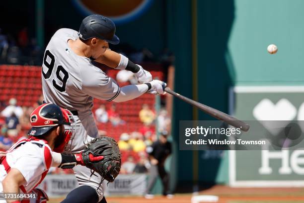 Aaron Judge of the New York Yankees connects on a hit during the first inning of game one of a doubleheader against the Boston Red Sox at Fenway Park...