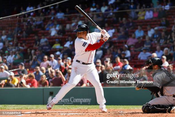 Rafael Devers of the Boston Red Sox waits for a pitch during an at-bat against the New York Yankees in the first inning of game one of a doubleheader...