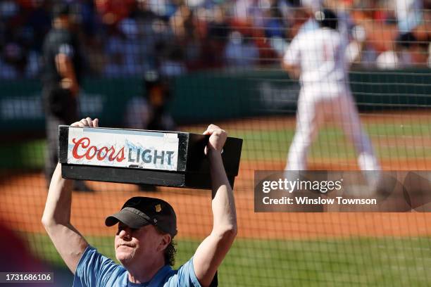 Coors Light vendor during the first inning of game one of a doubleheader between the Boston Red Sox and the New York Yankees at Fenway Park on...