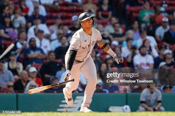 Gleyber Torres of the New York Yankees watches a home run against the Boston Red Sox during the sixth inning of game one of a doubleheader at Fenway...