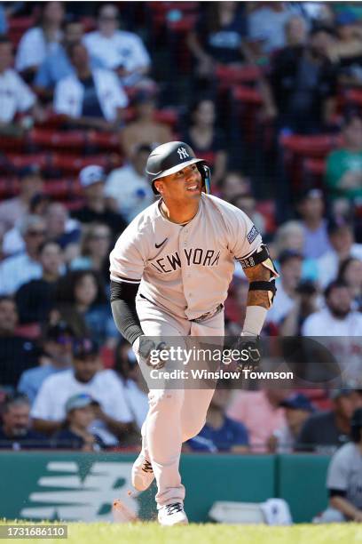 Gleyber Torres of the New York Yankees watches a home run against the Boston Red Sox during the sixth inning of game one of a doubleheader at Fenway...