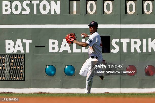 Ceddanne Rafaela of the Boston Red Sox fields a ball against the New York Yankees during the sixth inning of game one of a doubleheader at Fenway...