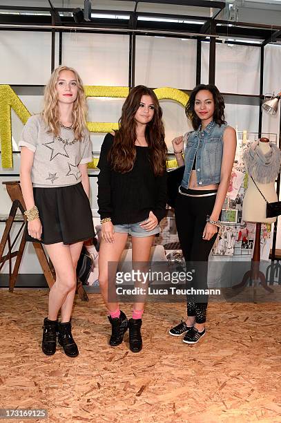 Selena Gomez and models attend a photocall to launch the Selena Gomez by adidas NEO collection on July 9, 2013 in Berlin, Germany.