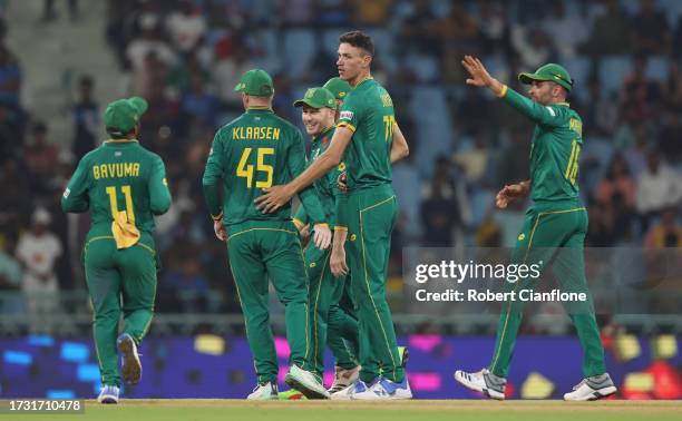 Marco Jansen of South Africa celebrates the wicket of Mitchell Starc of Australia during the ICC Men's Cricket World Cup India 2023 between Australia...