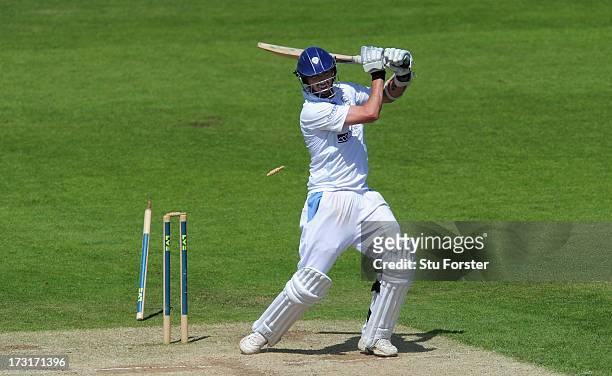 Derbyshire batsman Mark Footitt is bowled by Durham bowler Chris Rushworth during day two of the LV County Championship division One match between...