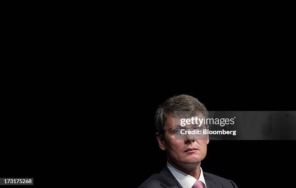 Thorsten Heins, chief executive officer of BlackBerry, listens during the company's annual general meeting in Waterloo, Ontario, Canada, on Tuesday,...