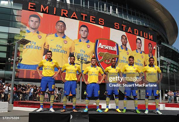 Carl Jenkinson, Alex Oxlade-Chamberlain, Jack Wilshere, Theo Walcott, Aaron Ramsey and Kieran Gibbs of Arsenal poses during the launch of the new...