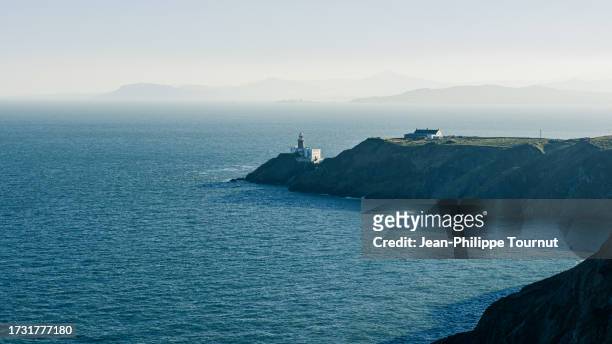 panoramic view of baily lighthouse on howth peninsula, county fingal, ireland - irish stock pictures, royalty-free photos & images