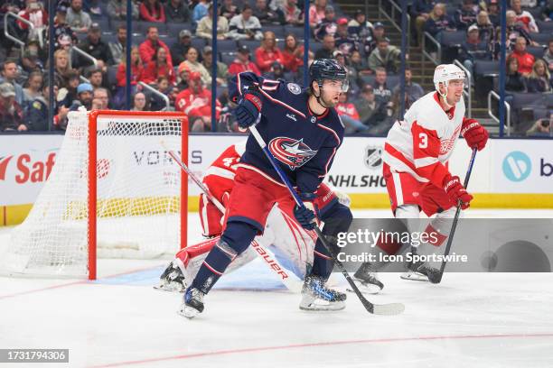 Columbus Blue Jackets Center Adam Fantilli attacks the net during the NHL game between the Columbus Blue Jackets and the Detroit Red Wings on October...