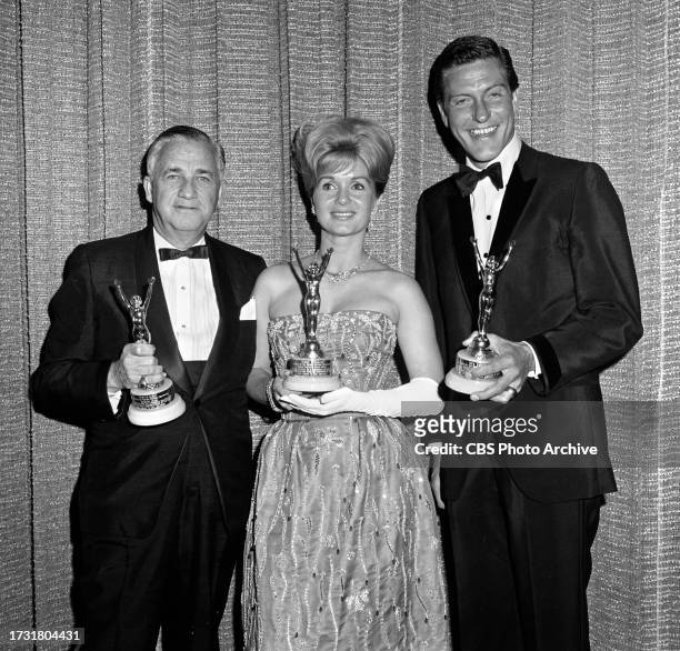 The Annual Motion Picture Costumers' Adam and Eve Awards event. October 12, 1963. Hollywood, CA. Pictured from left is Mervyn LeRoy , Debbie Reynolds...