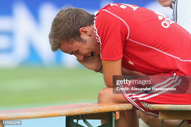 Mario Goetze of Bayern Muenchen looks on during the friendly match between Brescia Calcio and FC Bayern Muenchen at Campo Sportivo on July 9, 2013 in...