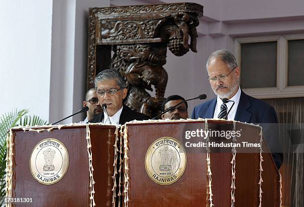 Newly appointed Lieutenant Governor of Delhi, Najeeb Jung, taking oath by Chief Justice of the Delhi High Court Justice Badar Durrez Ahmed during a...