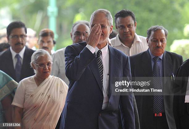 Newly appointed Lieutenant Governor of Delhi, Najeeb Jung, with Delhi Chief Minister Sheila Dikshit arrive ceremony hall before taking oath at Raj...