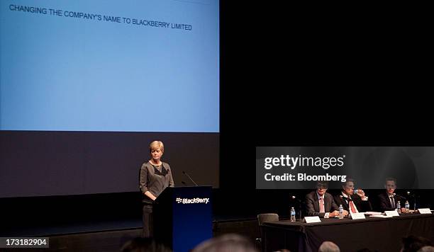 Barbara Stymiest, chairman of BlackBerry, left, speaks while Thorsten Heins, chief executive officer of BlackBerry, second left, listens during the...