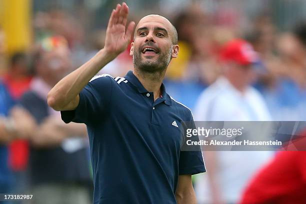 Head coach Josep Guardiola of FC Bayern Muenchen gesture during the friendly match between Brescia Calcio and FC Bayern Muenchen at Campo Sportivo on...