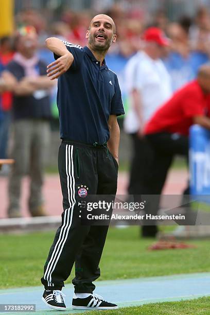 Head coach Josep Guardiola of FC Bayern Muenchen gesture during the friendly match between Brescia Calcio and FC Bayern Muenchen at Campo Sportivo on...