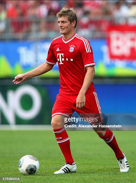 Toni Kroos of Bayern Muenchen runs with ball during the friendly match between Brescia Calcio and FC Bayern Muenchen at Campo Sportivo on July 9,...
