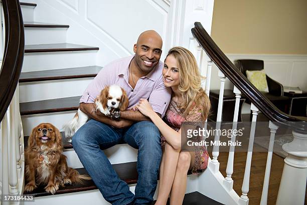 Former football player Tiki Barber and wife Traci Lynn Johnson are photographed for Hudson Mod on April 24, 2013 in Morris County, New Jersey....