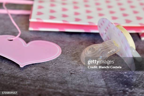 Table Pacifier Photos and Premium High Res Pictures - Getty Images