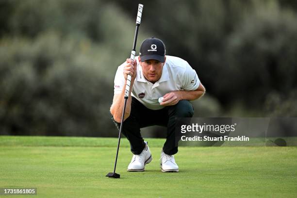 Wil Besseling of Netherlands lines up a putt on the ninth green on Day One of the acciona Open de Espana presented by Madrid at Club de Campo Villa...