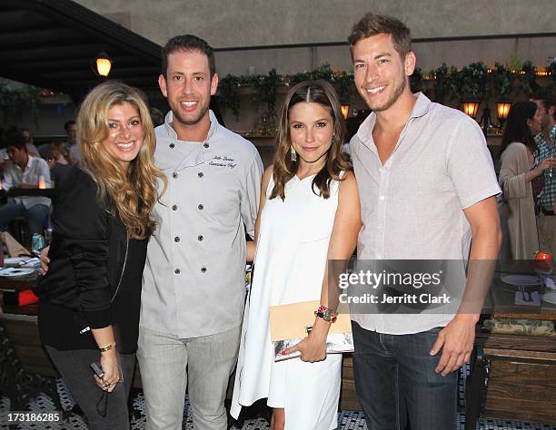 Alisha Levine, Executive Chef Seth Levine, Sophia Bush and Dan Fredinburg attend Sophia Bush's Birthday Party at Hotel Chantelle on July 8, 2013 in...