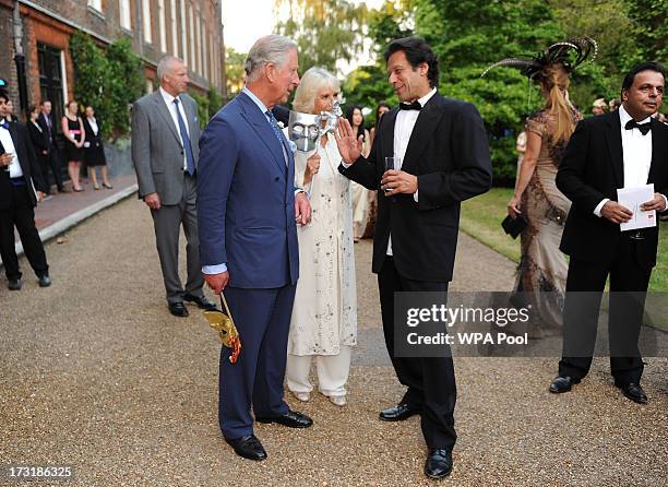 Prince Charles, Prince of Wales and Camilla, Duchess of Cornwall meet with politician and former cricketer Imran Khan as they host a reception for...