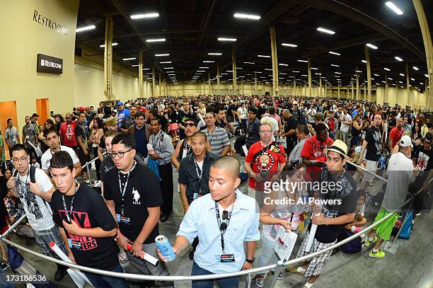Fans line up to enter on day one of the UFC Fan Expo Las Vegas 2013 at the Mandalay Bay Convention Center on July 5, 2013 in Las Vegas, Nevada.