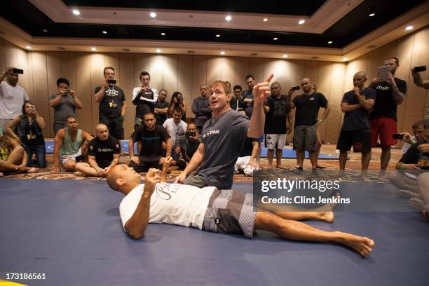 Former UFC champions Matt Hughes and B.J. Penn teach a seminar for fans during day one of the UFC Fan Expo Las Vegas 2013 at the Mandalay Bay...