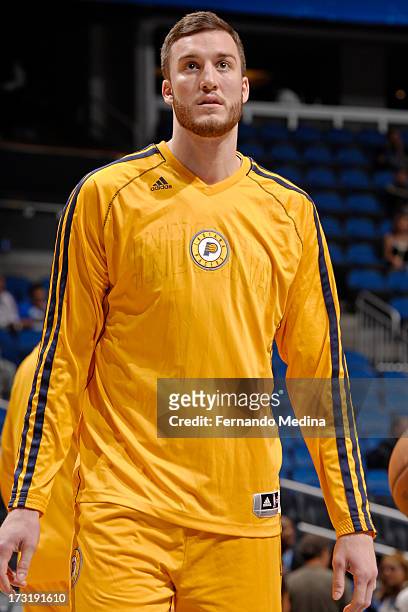 Miles Plumlee of the Indiana Pacers warms up before the game against the Orlando Magic on March 8, 2013 at Amway Center in Orlando, Florida. NOTE TO...