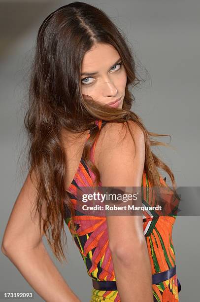 Model Adriana Lima walks the runway at Desigual's Spring-Summer 2014 Collection "For Everybody: Sex, Fun & Love" during 080 Barcelona Fashion Week on...