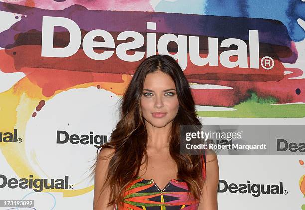 Model Adriana Lima poses during a photocall for Desigual's Spring-Summer 2014 Collection "For Everybody: Sex, Fun & Love" during 080 Barcelona...
