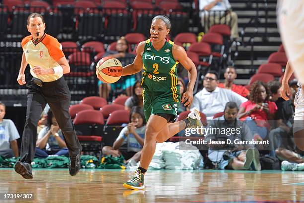 Tameka Johnson of the Seattle Storm drives up-court against the New York Liberty during the game on July 9, 2013 at Prudential Center in Newark, New...