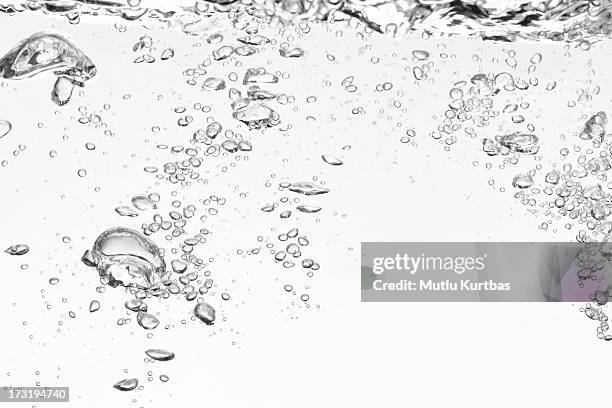 bubbles forming in clear water - 2012 stock pictures, royalty-free photos & images