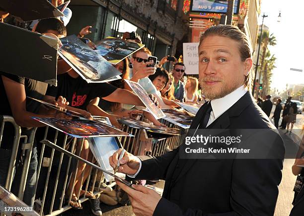 Actor Charlie Hunnam arrives at the premiere of Warner Bros. Pictures' and Legendary Pictures' "Pacific Rim" at Dolby Theatre on July 9, 2013 in...