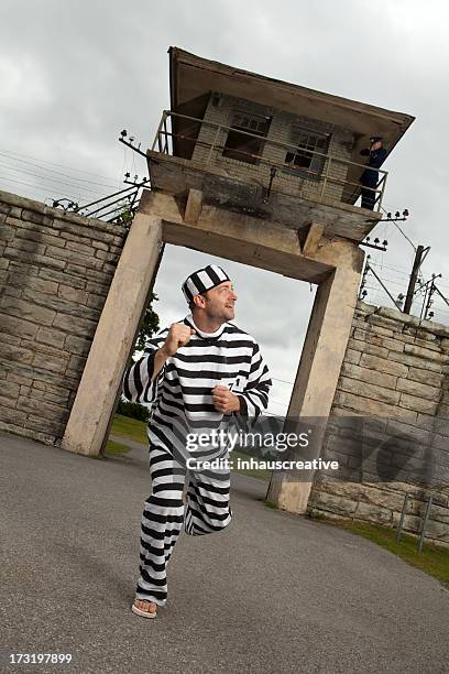 prisoner trying to escape - prison escape stock pictures, royalty-free photos & images