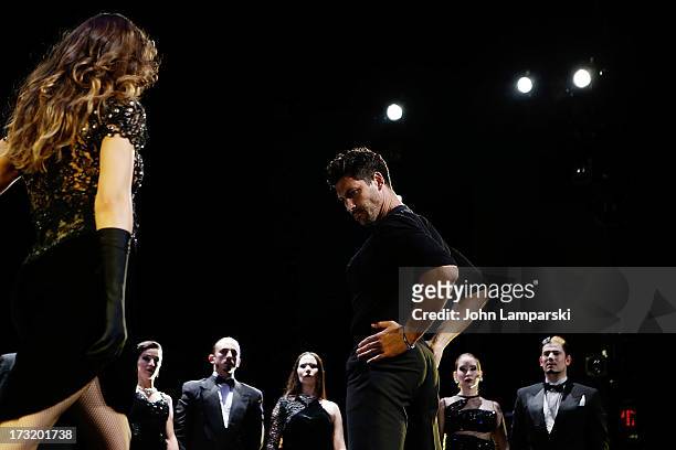 Karina Smirnoff and Maksim Chmerkovskiy perform during the "Forever Tango" curtain call on Broadway at Walter Kerr Theatre on July 9, 2013 in New...