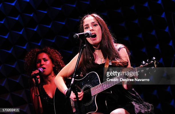 Singer/songwriter Samia Najimy Finnerty performs at Samia Najimy Finnerty PETA Ad Unveiling & Performance at Joe's Pub on July 9, 2013 in New York...
