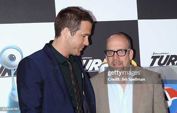 Actors Ryan Reynolds and Paul Giamatti attend the "Turbo" New York Premiere at AMC Loews Lincoln Square on July 9, 2013 in New York City.