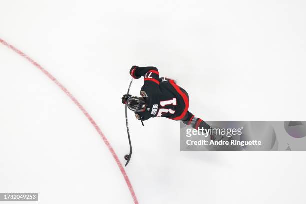 Ridly Greig of the Ottawa Senators shoots the puck during warm-up before a game against the against the Washington Capitals at Canadian Tire Centre...