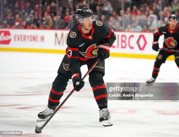 Travis Hamonic of the Ottawa Senators skates with the puck against the Washington Capitals at Canadian Tire Centre on October 18, 2023 in Ottawa,...