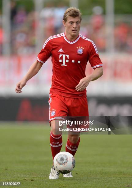 German Bundesliga first division football club FC Bayern Munich's midfielder Toni Kroos kicks the ball during a test match between FC Bayern Munich...